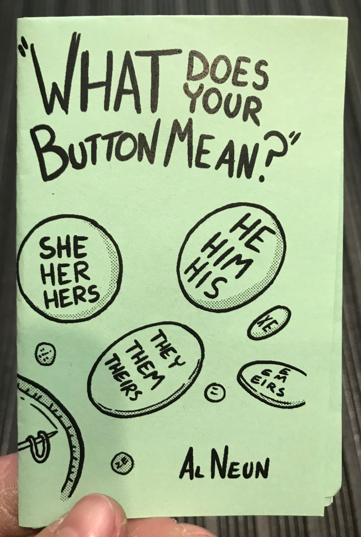 What Does Your Button Mean? by Al Neun